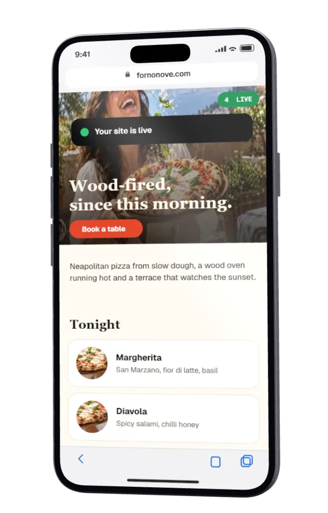 A phone showing a website for an invented pizzeria